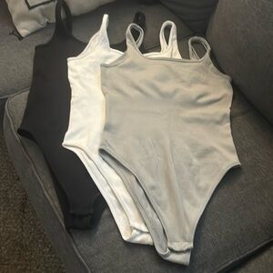 3 bodysuits!